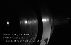 Spinning shaft filmed in slow motion with a Fastec high speed camera for industrial machinery troubleshooting